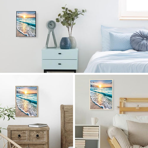 Diamond painting kit with a seaside sunset scene hanging on a wall in a bedroom setting