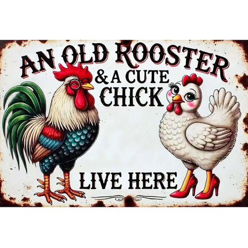 Vintage metal sign with illustration of a rooster and hen, text reads 'AN OLD ROOSTER & A CUTE CHICK LIVE HERE'