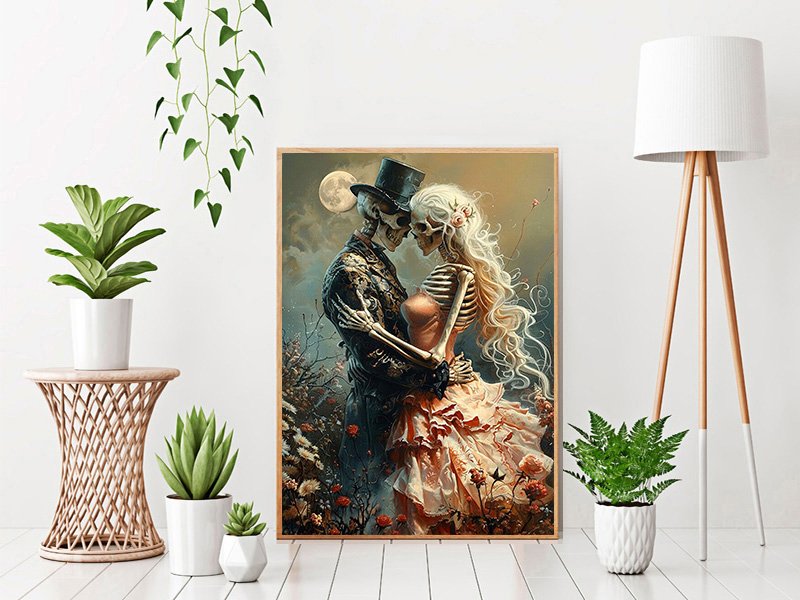 Diamond art kit painting of a skeleton couple embracing under a full moon, surrounded by flowers.
