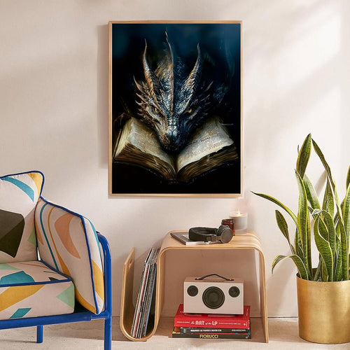 Framed diamond art kit painting of a dragon's head over an open book, displayed in a living room setting.