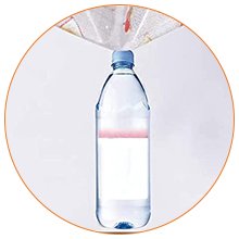 Clear plastic water bottle with pink liquid and white label, suspended from a patterned fabric.