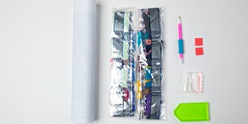Diamond painting kit contents including a rolled canvas, bags of diamonds, a pen, tray, and small containers.