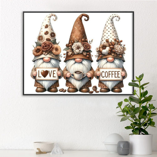 Three gnomes holding signs that say LOVE and COFFEE, with coffee beans and cups, part of a diamond art kit.