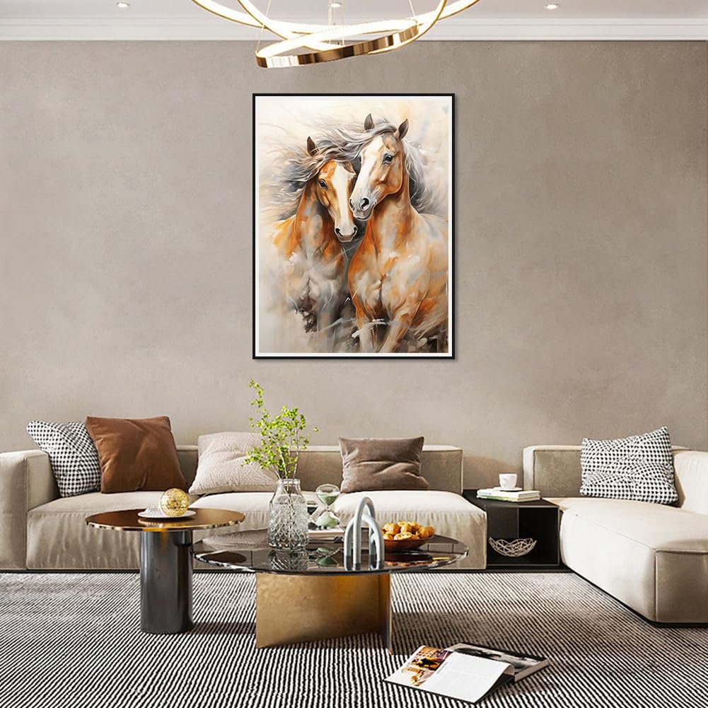 Two horses in a dynamic, artistic rendering, framed and hung on a wall above a sofa.
