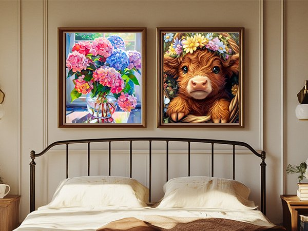 Two framed diamond paintings hanging above a bed: one of hydrangeas in a vase, the other of a fluffy calf wearing a flower crown.