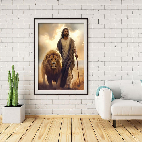 Framed 5D diamond painting of Jesus walking with a lion in a desert landscape, displayed on a white brick wall.