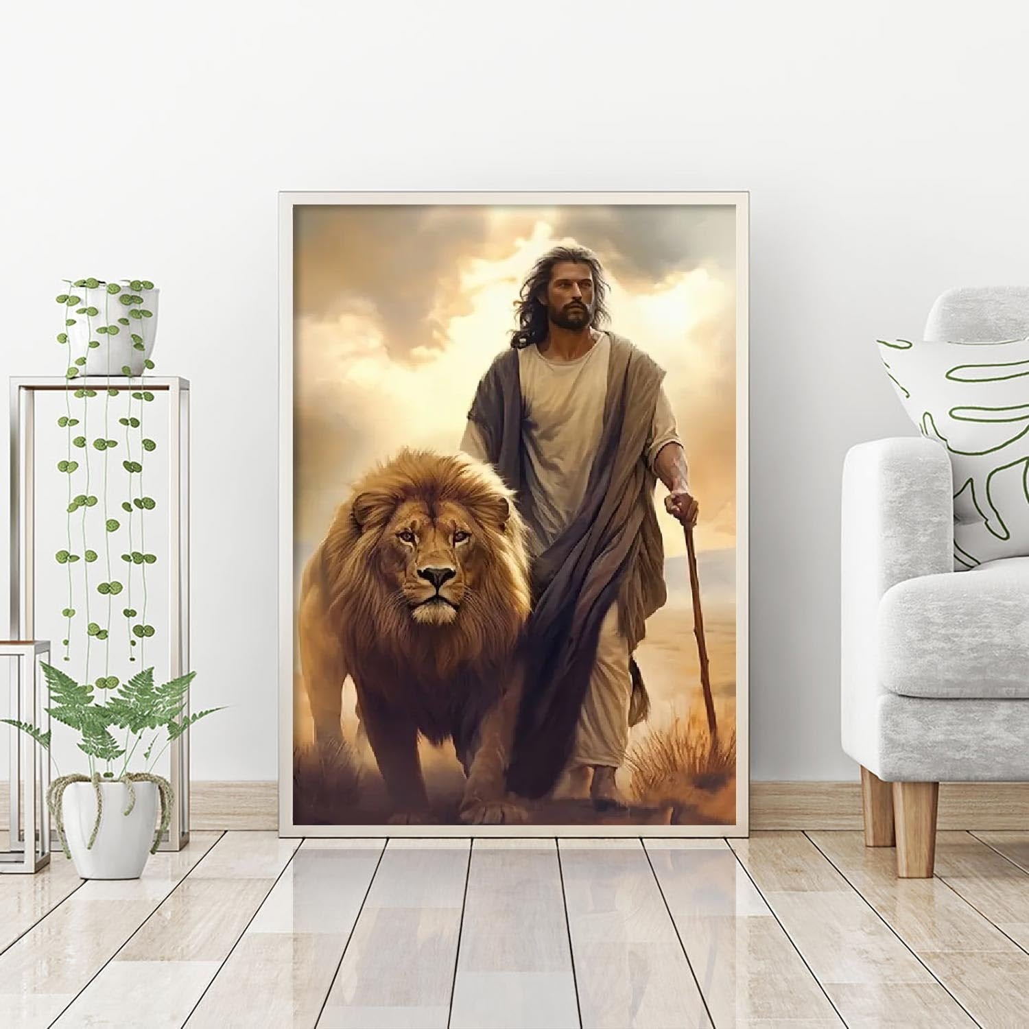 Jesus walking with a lion in a desert landscape, framed artwork on a wall.