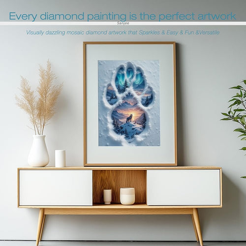 Framed 5D diamond painting of a wolf on a snowy mountain under the aurora borealis, displayed on a console table.