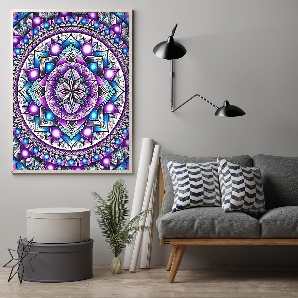 Framed mandala diamond painting art hanging on a wall above a sofa