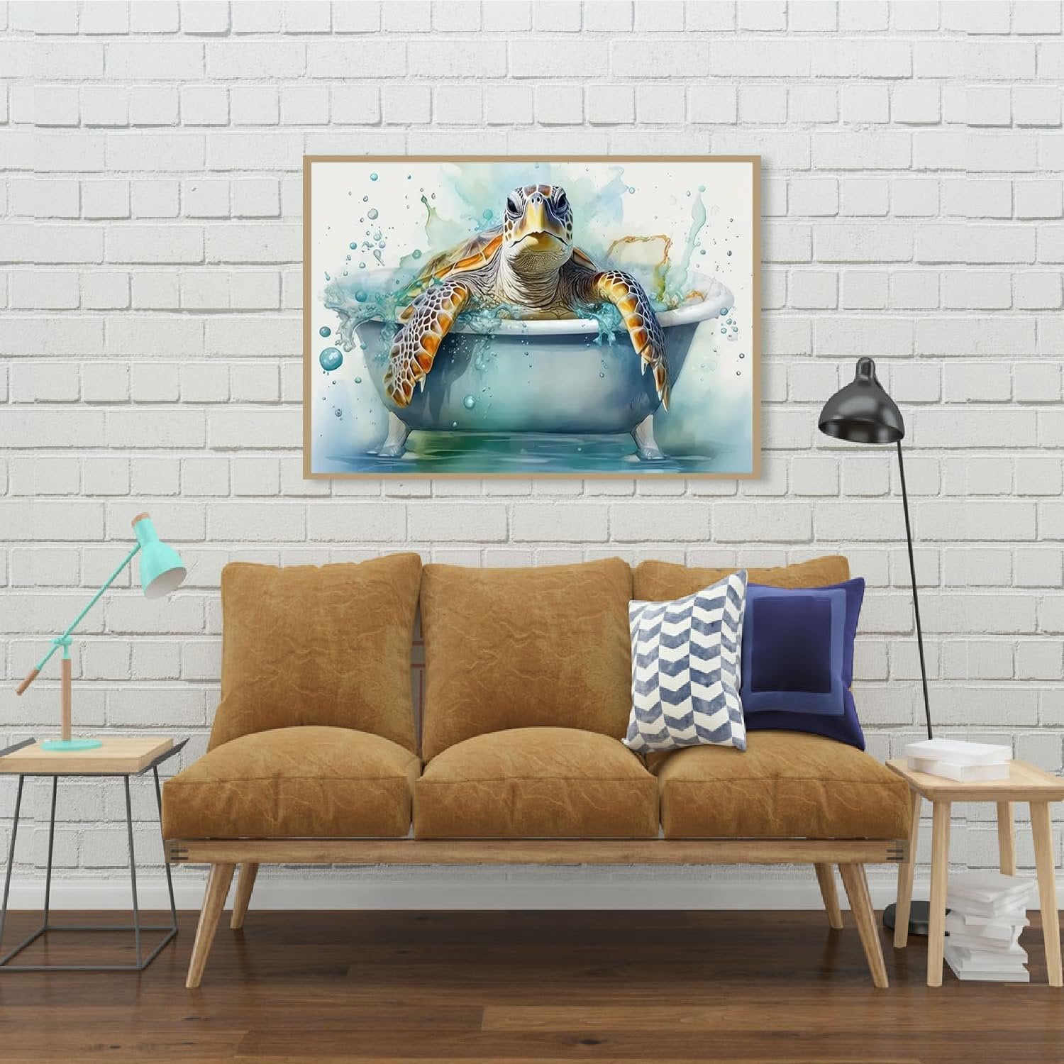 Framed diamond art painting of a sea turtle in a bathtub, displayed on a white brick wall above a sofa.