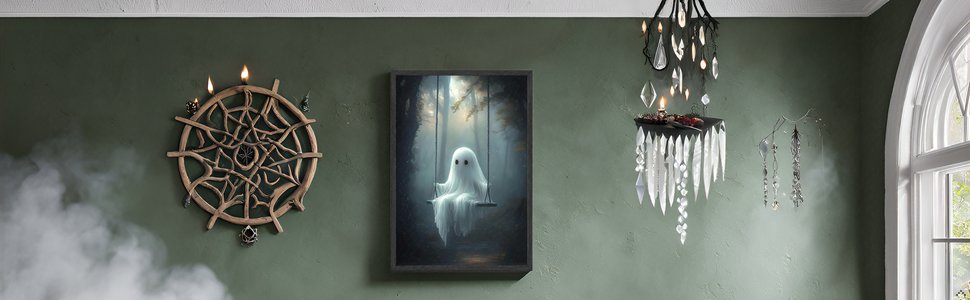 Framed canvas art of a ghost sitting on a swing in a misty forest, displayed on a green wall with Halloween decor.
