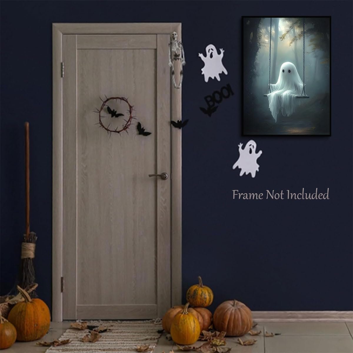 Halloween decor with a ghost on a swing painting, pumpkins, broom, and door decorations