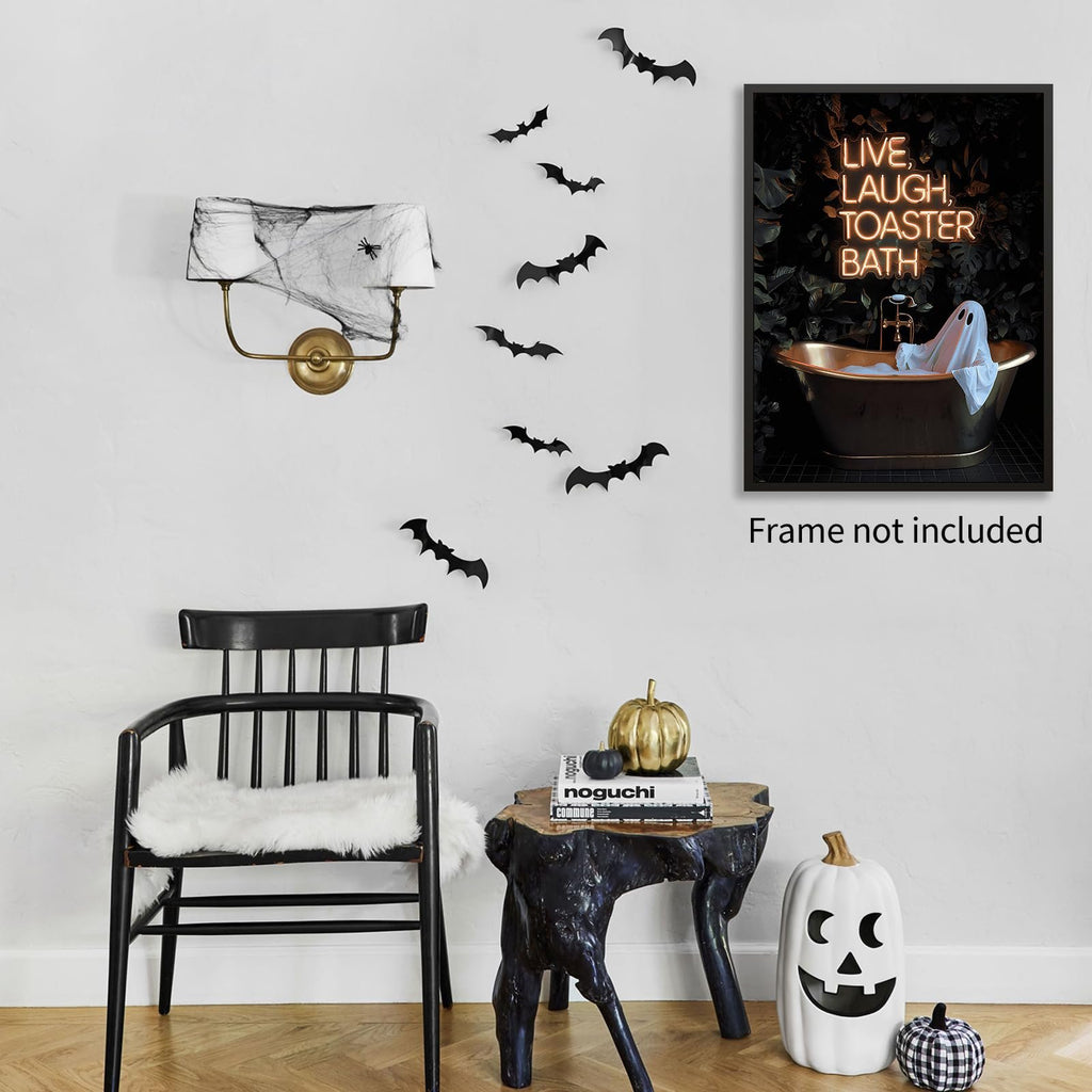 Halloween ghost in bathtub art print with neon text 'LIVE, LAUGH, TOASTER BATH' displayed on a wall with bats and a chair.