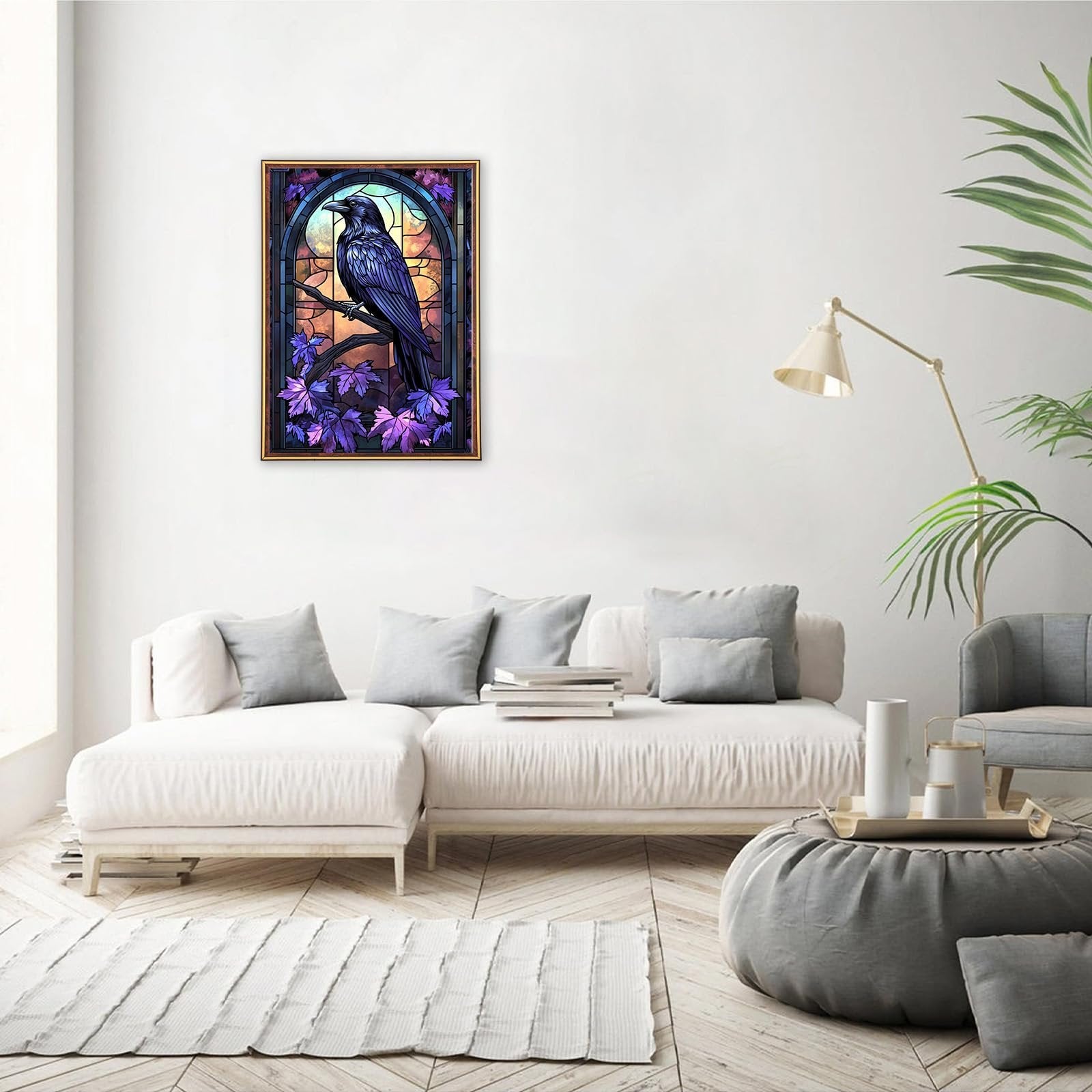 Framed diamond painting of a crow perched on a branch against a stained-glass window background, displayed in a modern living room.