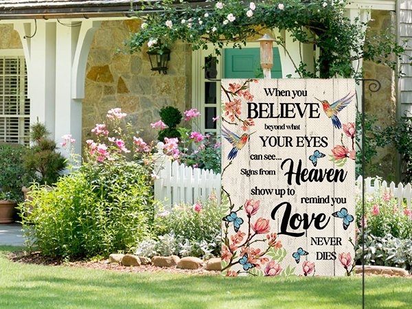 Double-sided garden flag with hummingbirds and flowers, featuring memorial text about love and heaven.