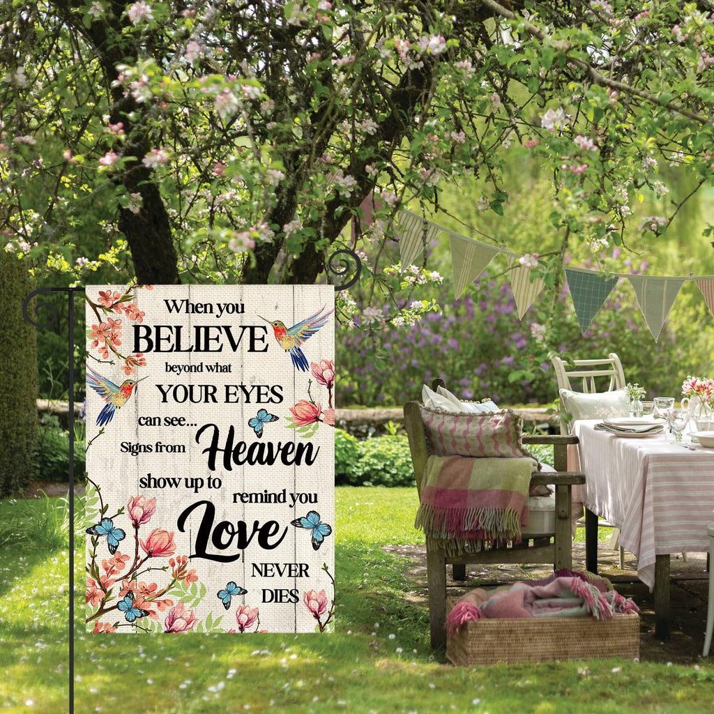 Double sided garden flag with hummingbird and floral design, reading 'When you BELIEVE beyond what YOUR EYES can see... Signs from Heaven show up to remind you Love NEVER DIES'.
