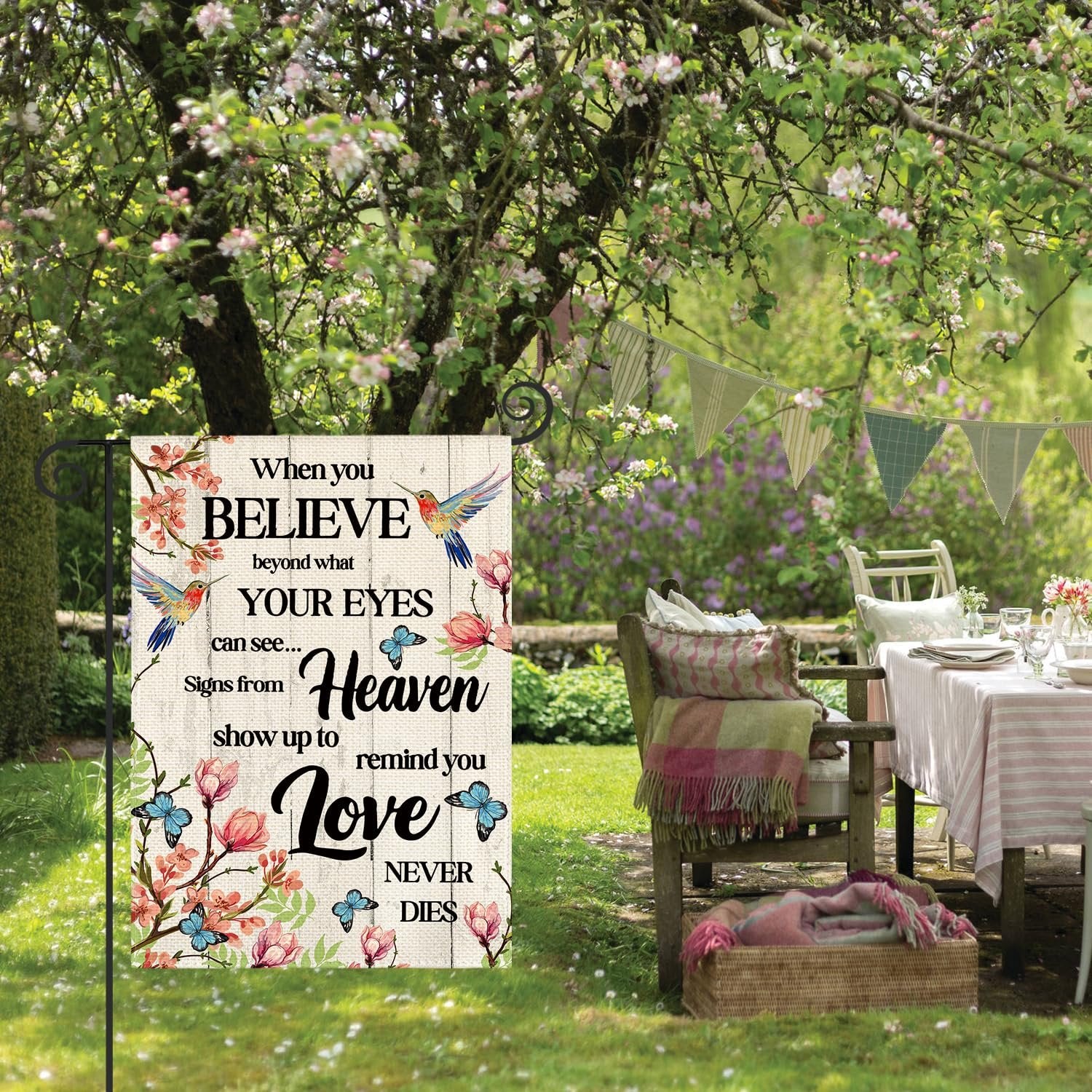 Double sided garden flag with hummingbird and floral design, reading 'When you BELIEVE beyond what YOUR EYES can see... Signs from Heaven show up to remind you Love NEVER DIES'.