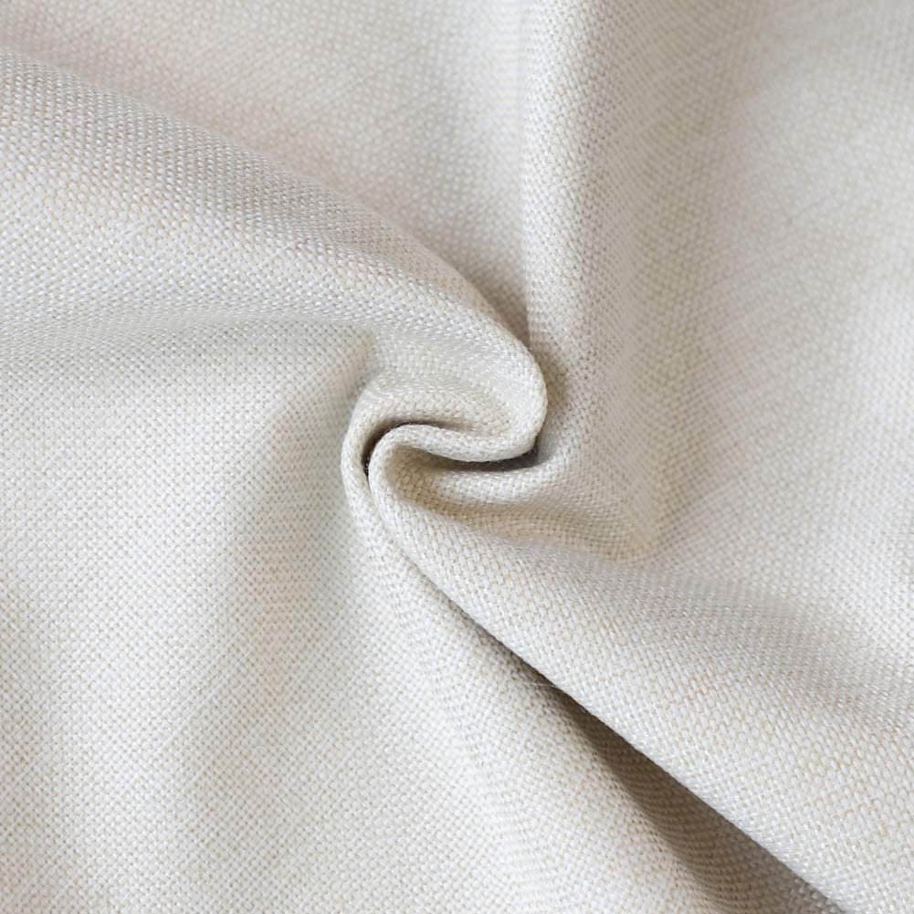 Close-up of beige faux linen fabric with a swirl texture, showing woven detail.