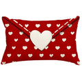 Red lumbar pillow cover with white heart pattern and a large white heart applique resembling an envelope flap.