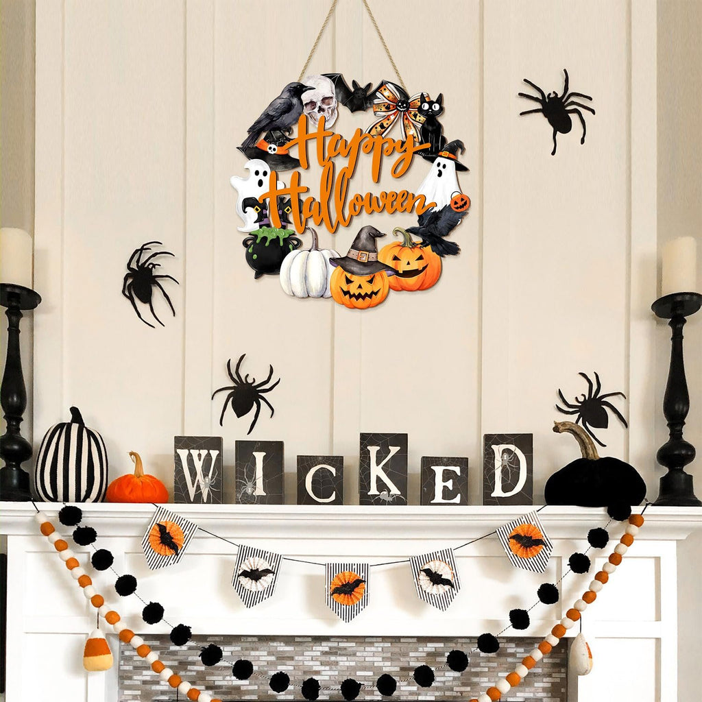 Happy Halloween door sign with ghost, black cat, pumpkin, skull, cauldron, witch hat, bow, and wreath decorations hanging above a fireplace mantel.