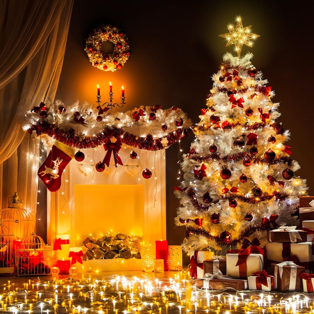 Christmas tree topper star with lights on a decorated white Christmas tree next to a fireplace