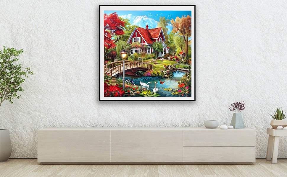 Countryside diamond painting kit featuring a red house, bridge, swans, and flowers by a pond.