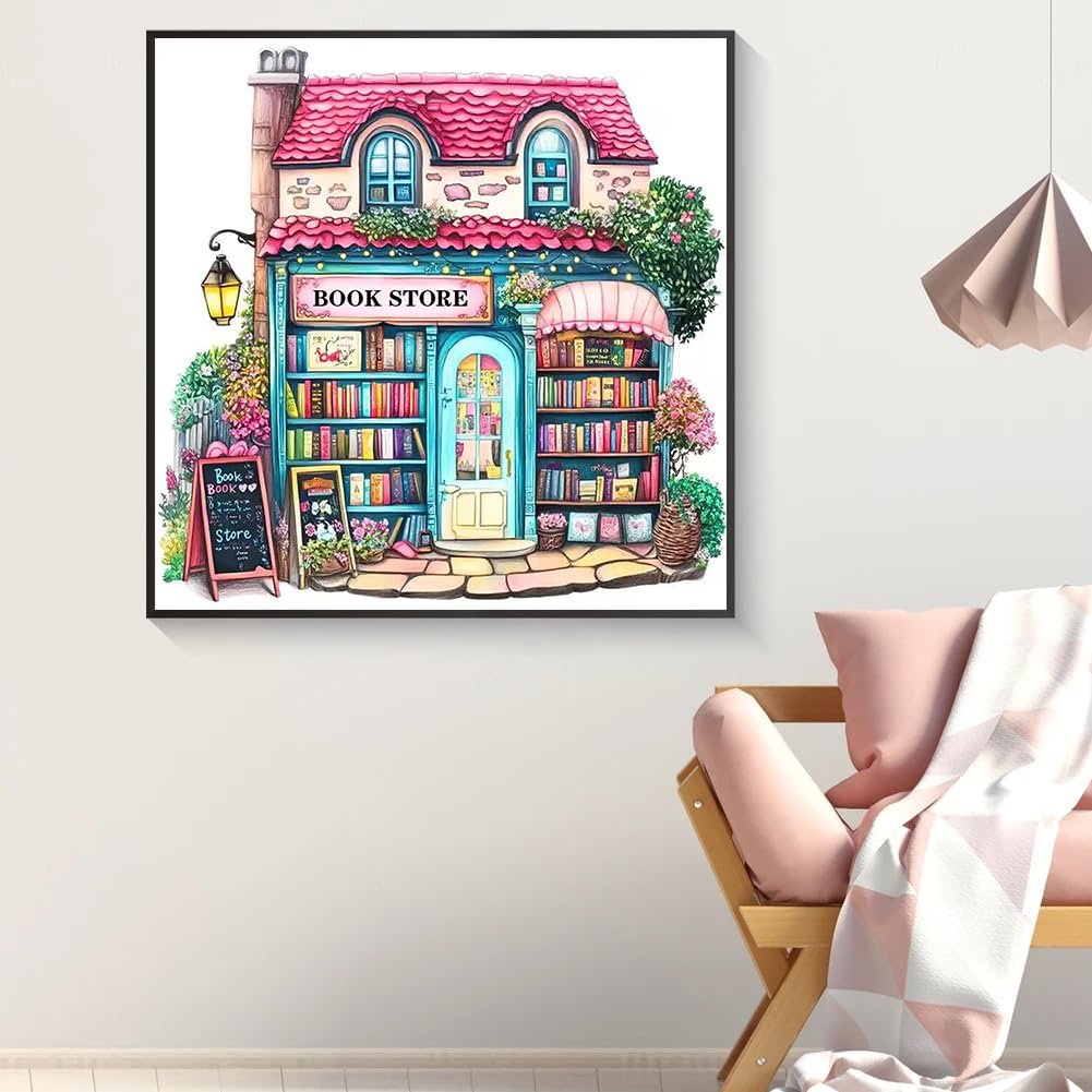 Diamond painting kit featuring a charming pink bookstore facade with colorful books and a lamp post.
