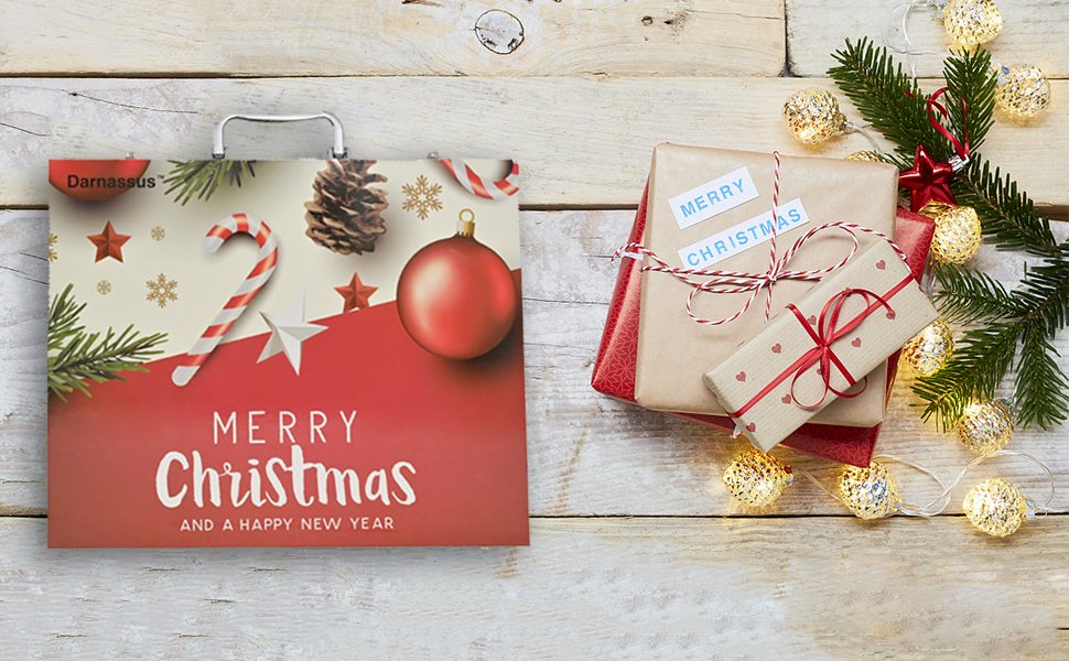 Christmas-themed art case with 'Merry Christmas and a Happy New Year' text, next to wrapped gifts and fairy lights.