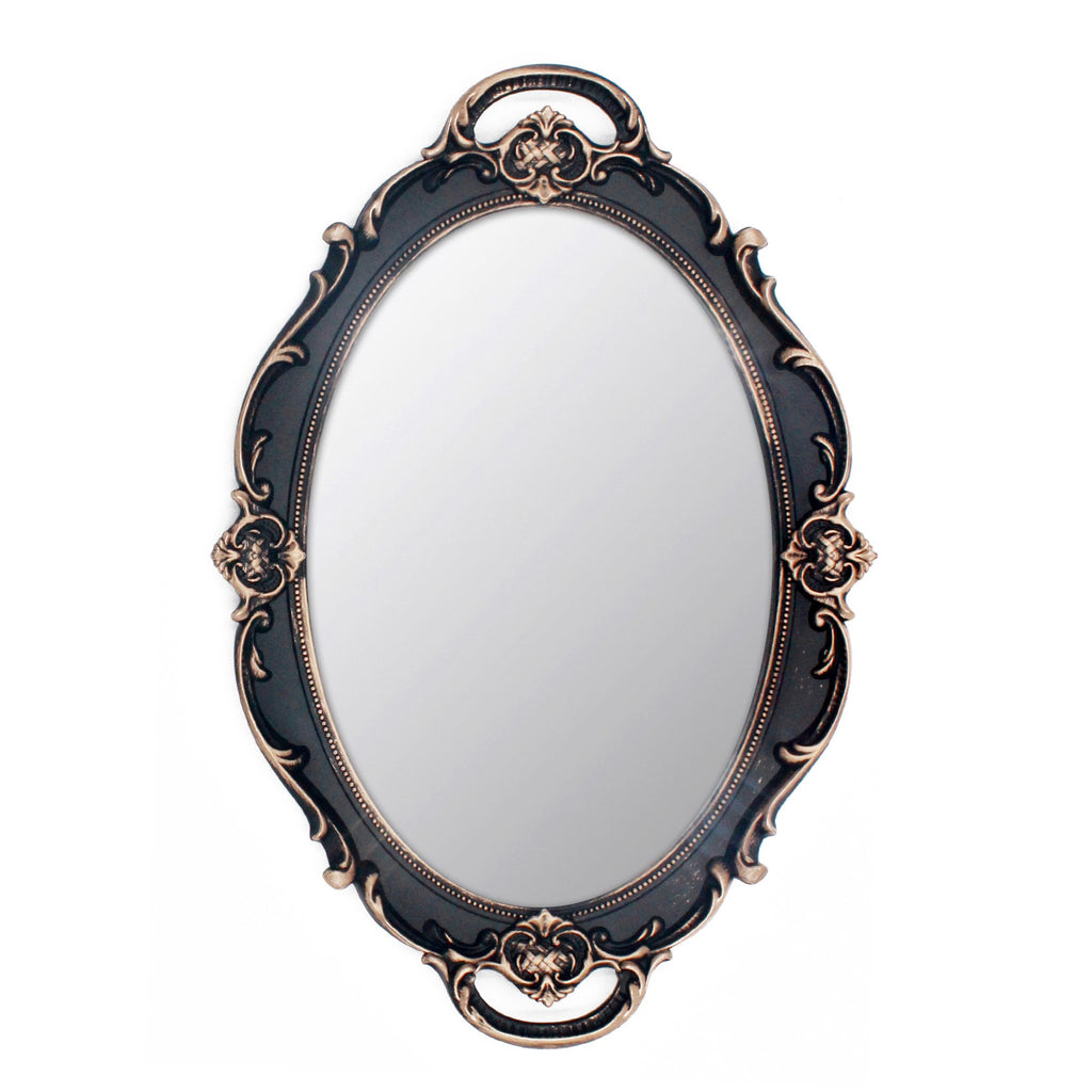 Oval decorative wall mirror with ornate black and gold frame, shown front-on against a white background.