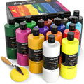Set of 14 acrylic paint bottles in various colors, with a palette knife and sponge in the foreground.