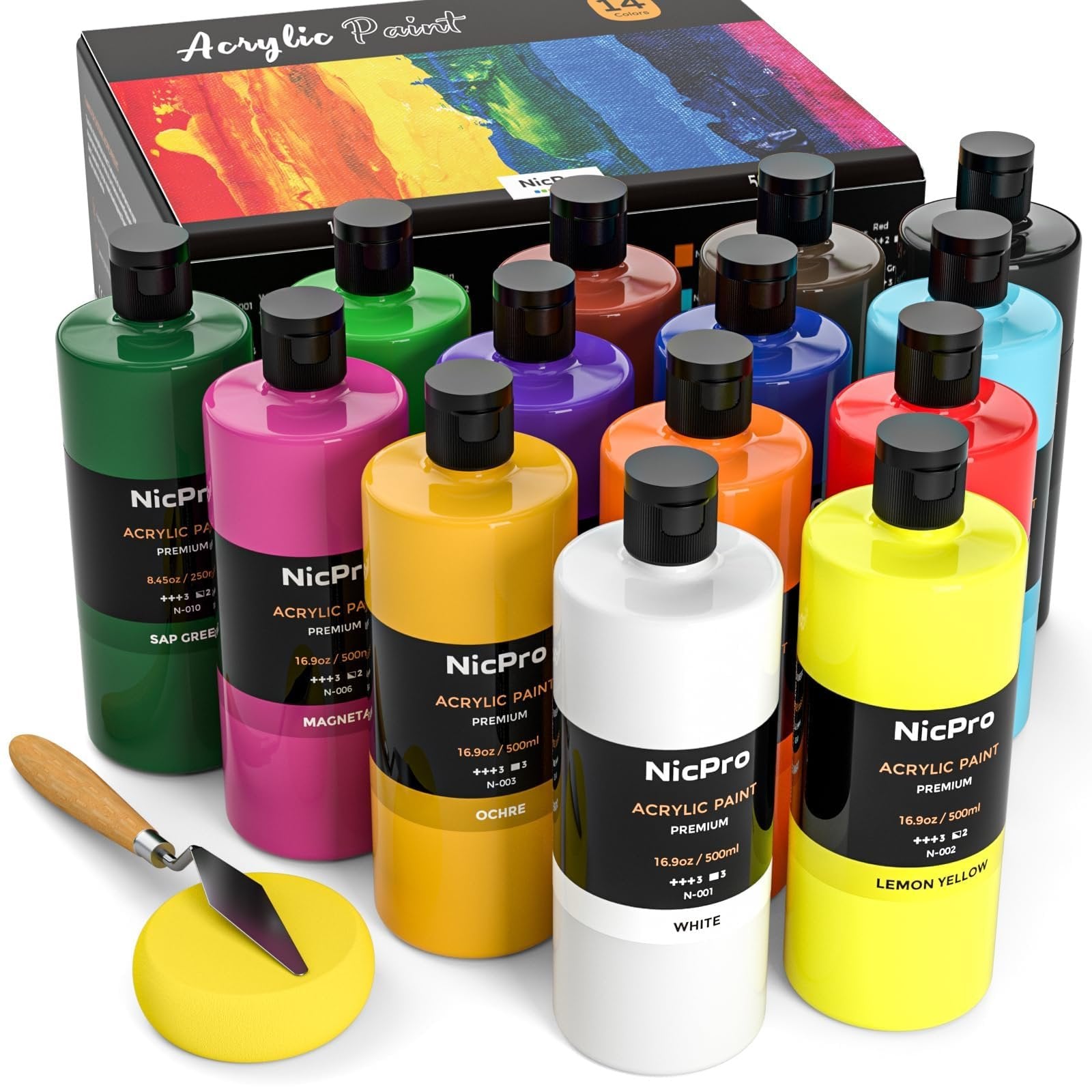 Set of 14 acrylic paint bottles in various colors, with a palette knife and sponge in the foreground.