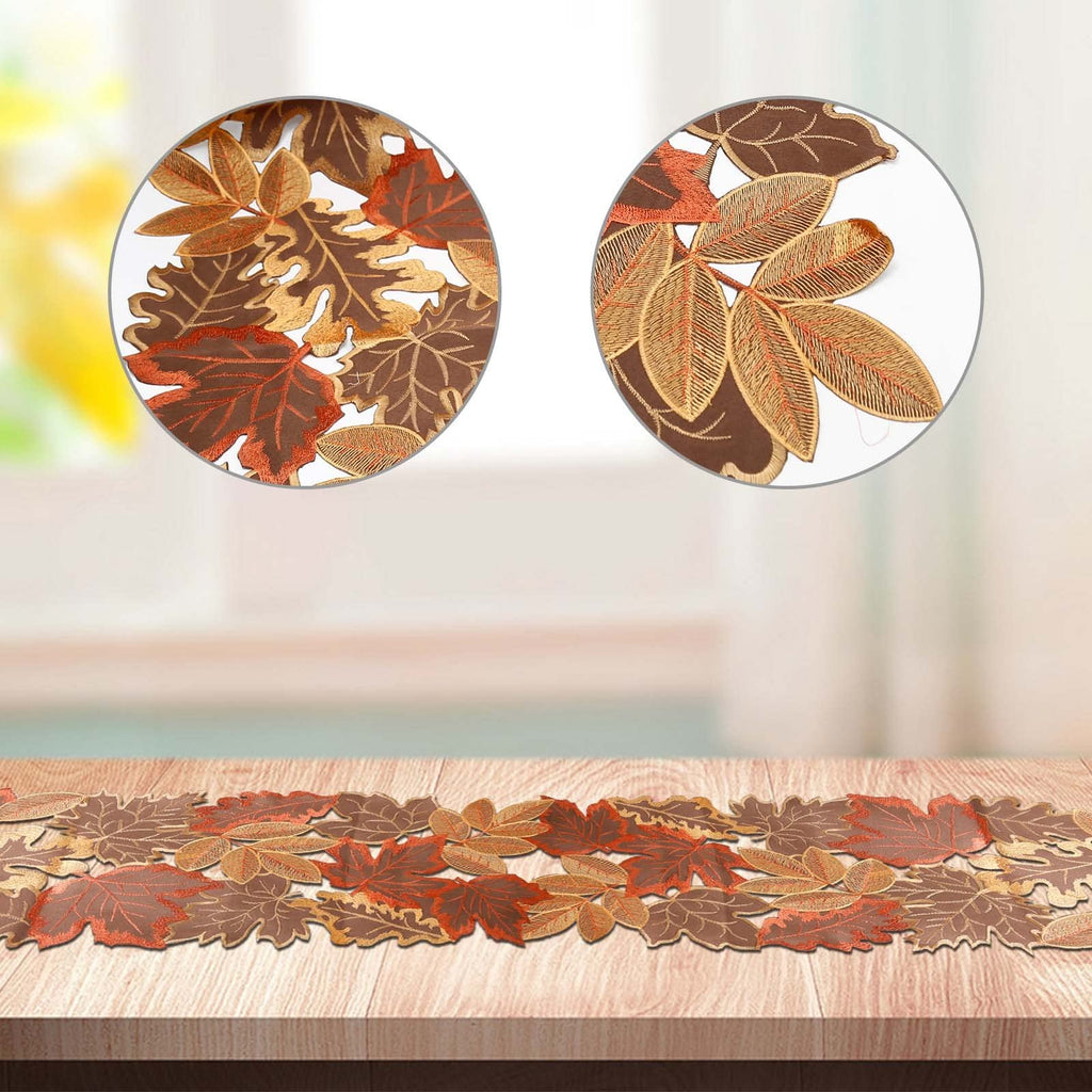 Embroidered fall leaves table runner on a wooden table, with close-up insets showing leaf detail.