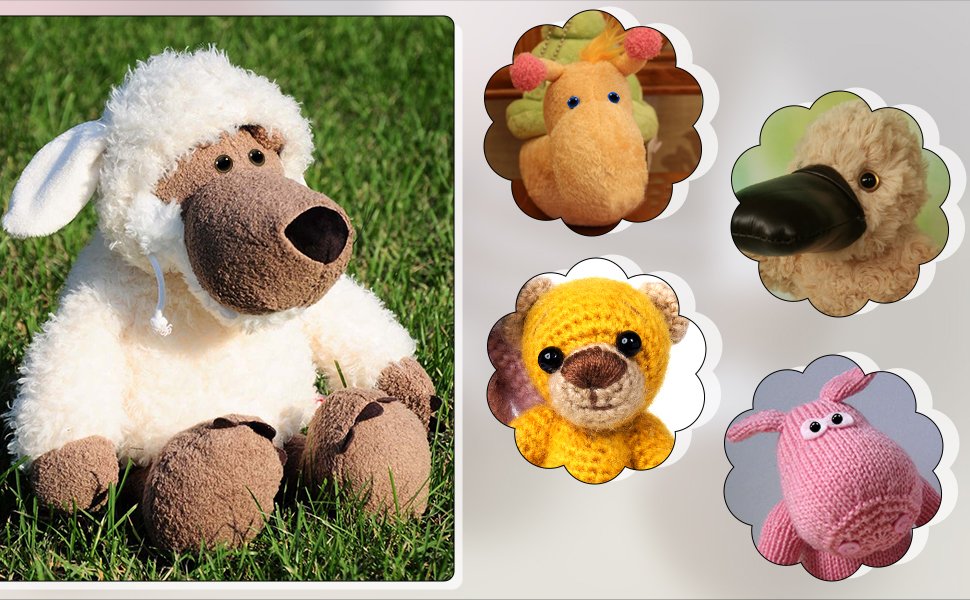 Plush sheep sitting on grass next to four small crocheted animal heads in decorative frames