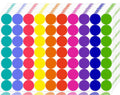 Stack of 10-color, 3/4 inch round dot stickers, viewed from an angle showing multiple sheets and rows of colorful dots.
