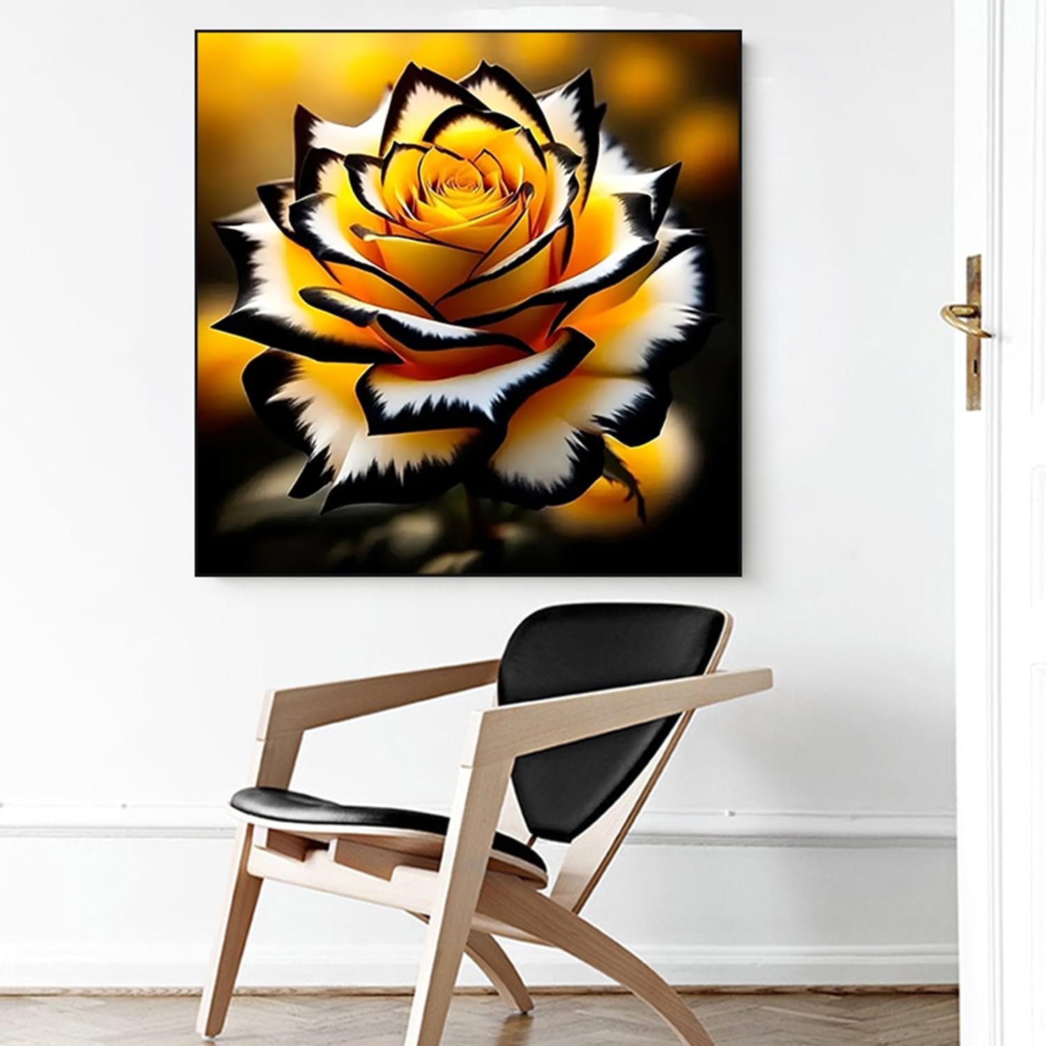 Diamond painting of a yellow rose with black and white edges, displayed on a wall above a chair.