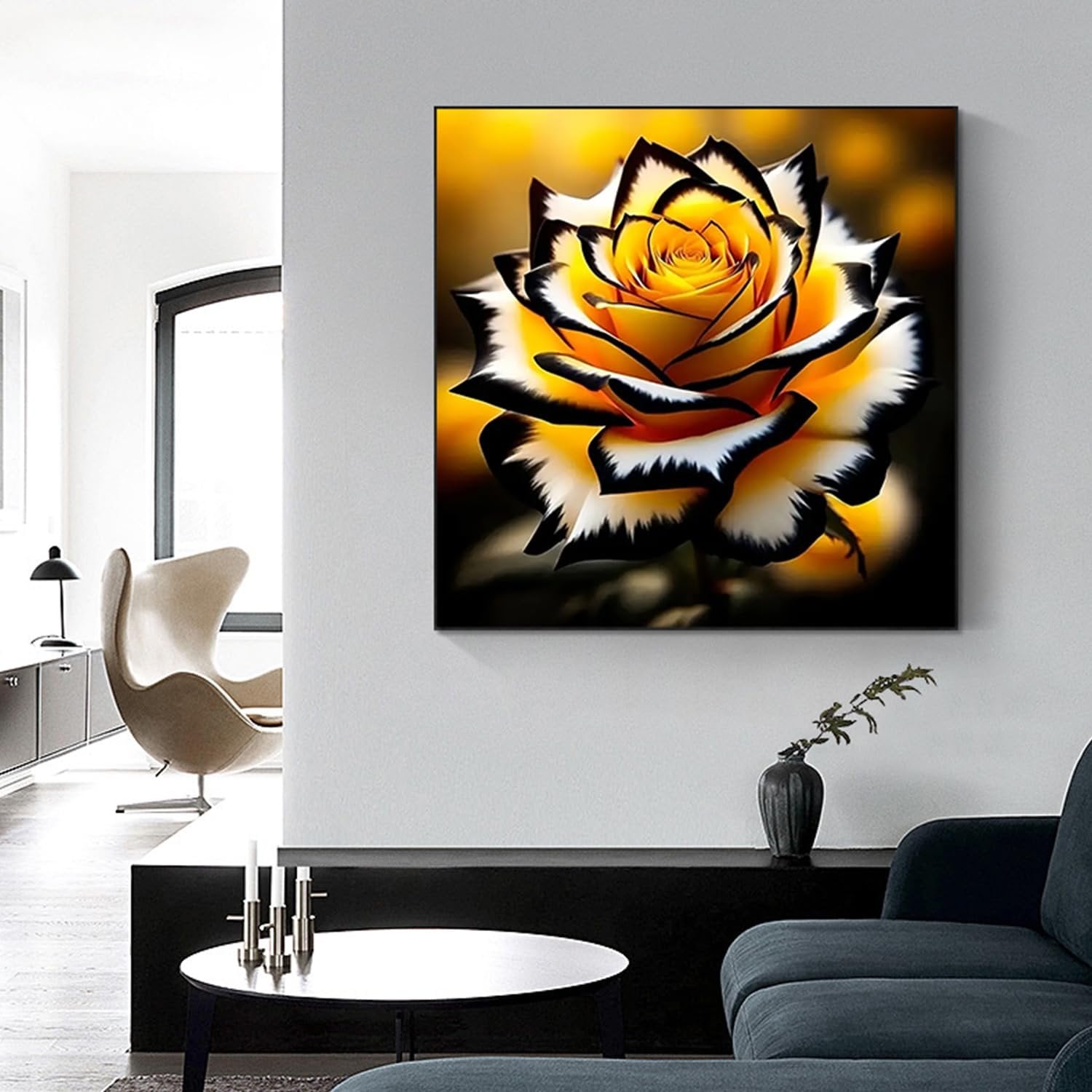 Framed 5D diamond painting of a yellow rose with black and white edges, displayed in a modern living room.