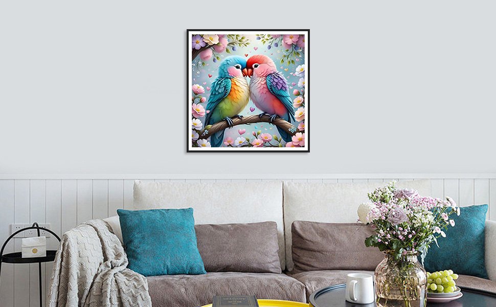 Framed 5D diamond painting of two lovebirds perched on a branch surrounded by flowers and hearts.