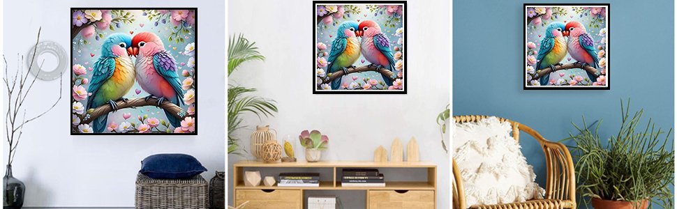 Diamond painting kit of two lovebirds perched on a branch with pink flowers and hearts, displayed in a home setting.