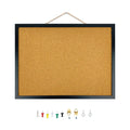 Black framed cork bulletin board with assorted push pins and mounting hardware displayed below