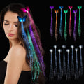 Woman with LED fiber optic hair extensions in butterfly and heart shapes, with multiple colors displayed.