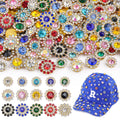 Assortment of colorful sew-on rhinestones and a blue baseball cap decorated with rhinestones.