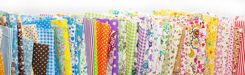 A collection of pre-cut fabric squares with various colorful abstract and floral patterns, displayed in a row.