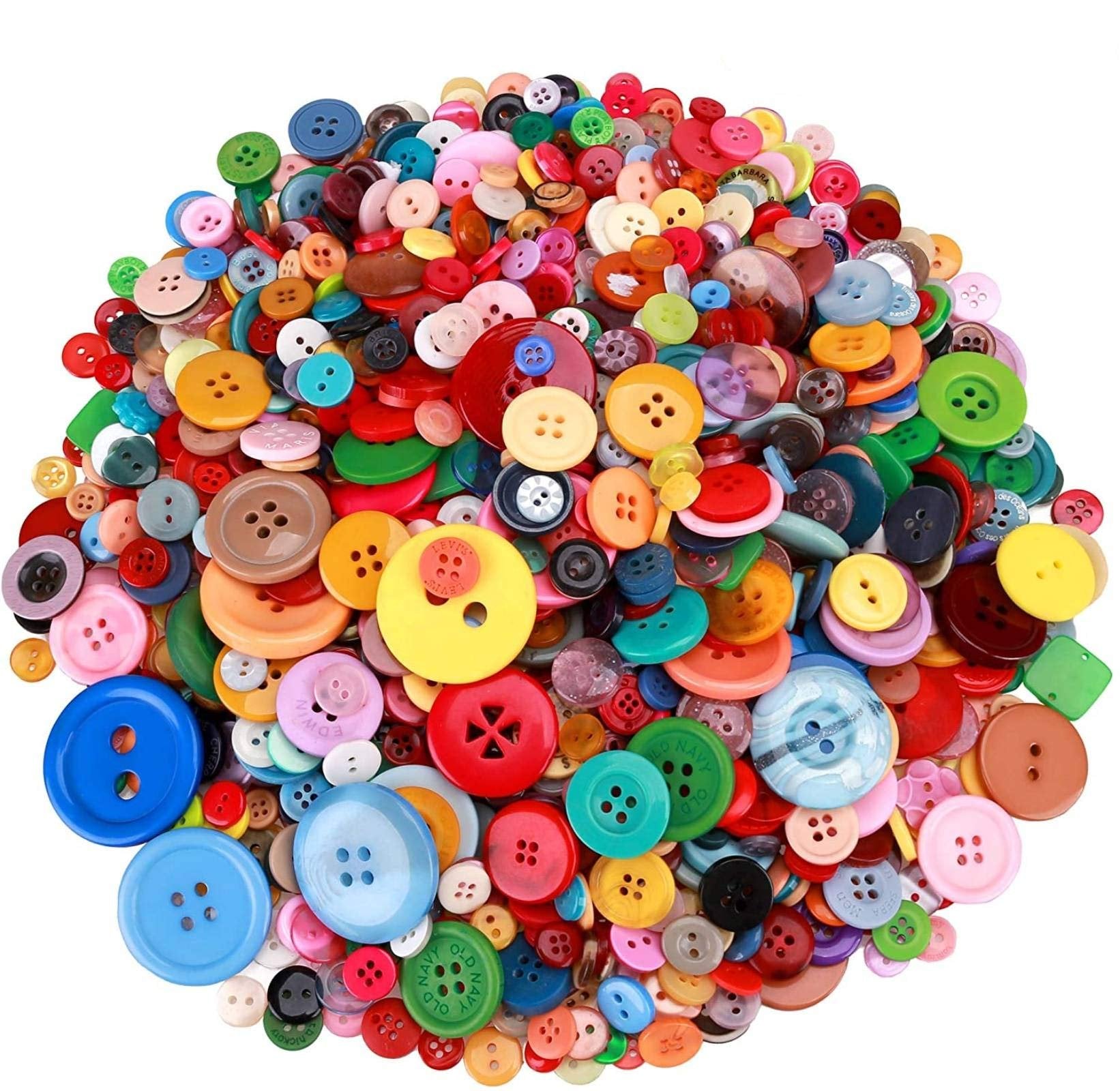 Pile of assorted round and square buttons in various colors and sizes, some with 2 holes and some with 4 holes.