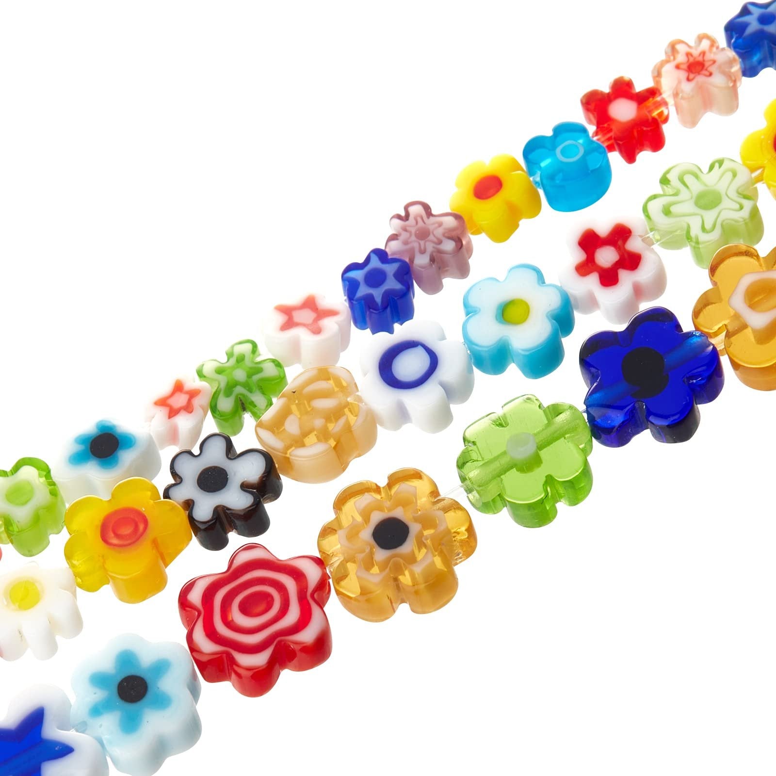 Assorted colorful flower-shaped glass beads arranged in diagonal lines on a white background.