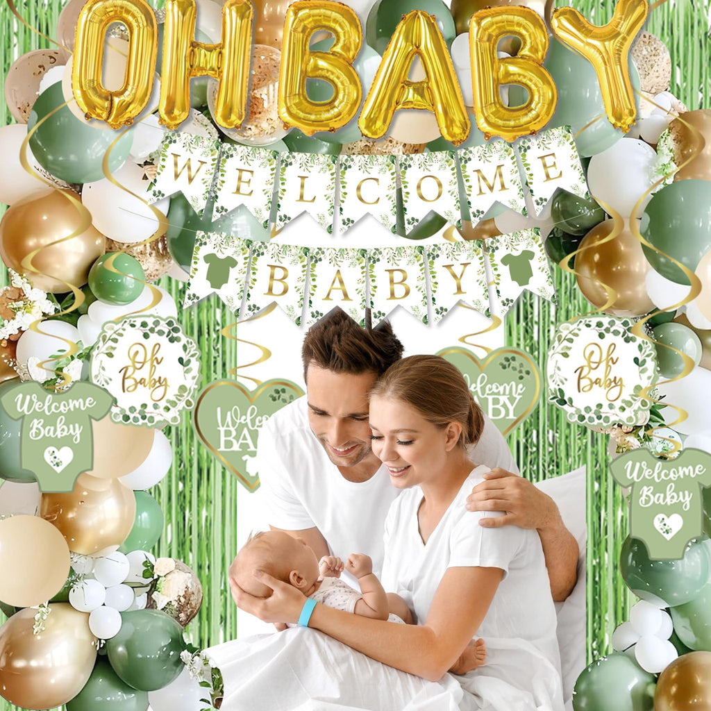 Sage green and gold balloon garland with 'Oh Baby' and 'Welcome Baby' banners, featuring a couple holding a newborn.