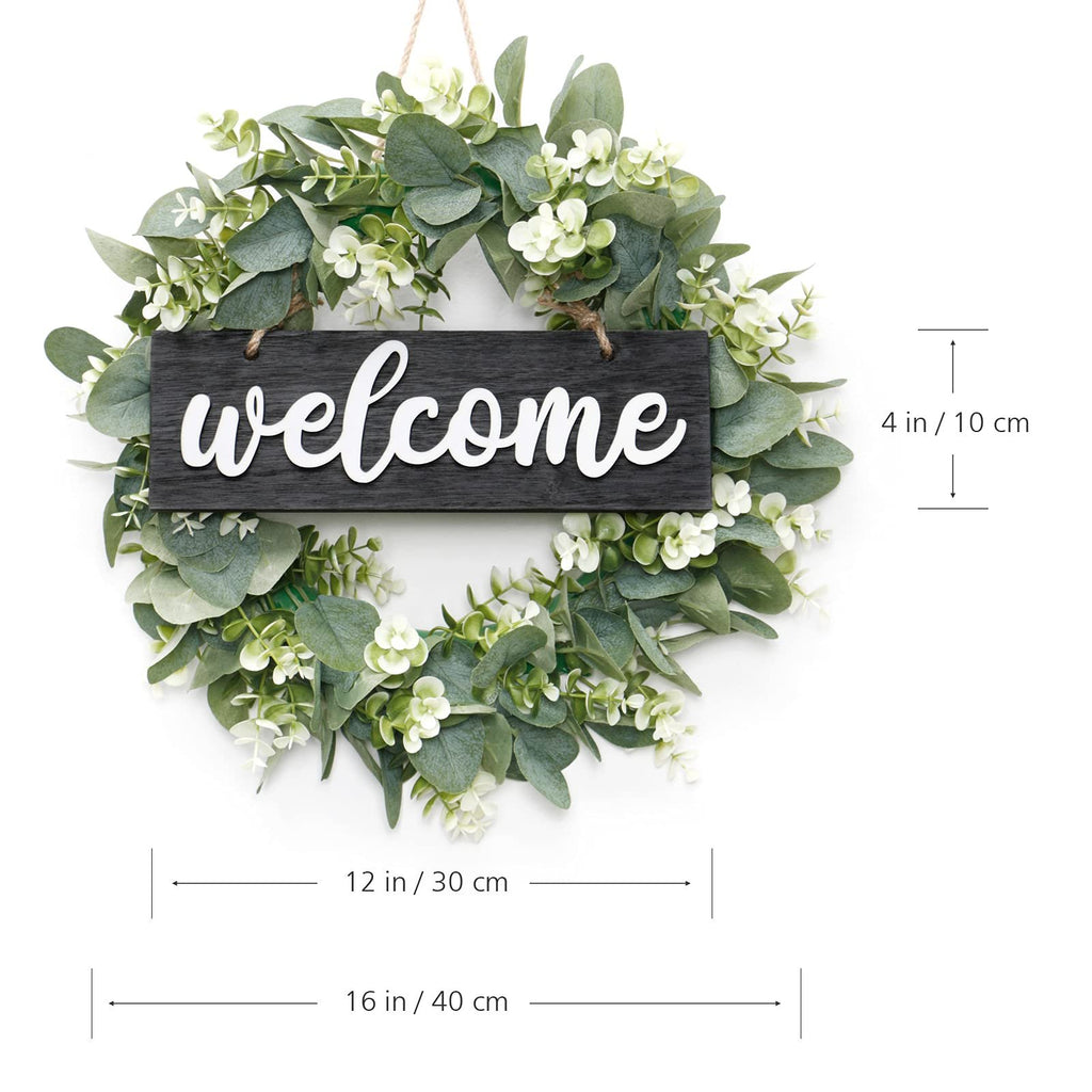 Artificial eucalyptus leaves wreath with a black welcome sign board and measurement indicators