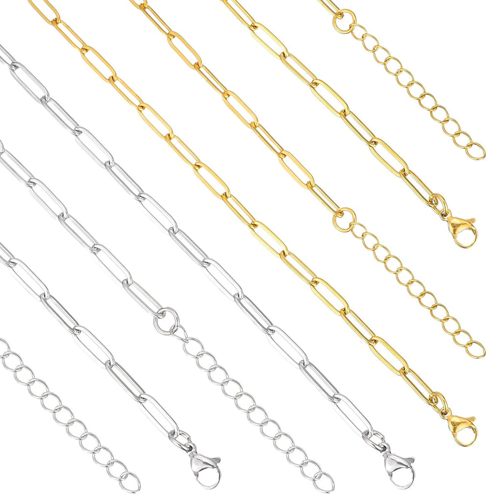 Gold and silver paperclip chains with lobster clasps and extension chains, displayed diagonally on a white background.