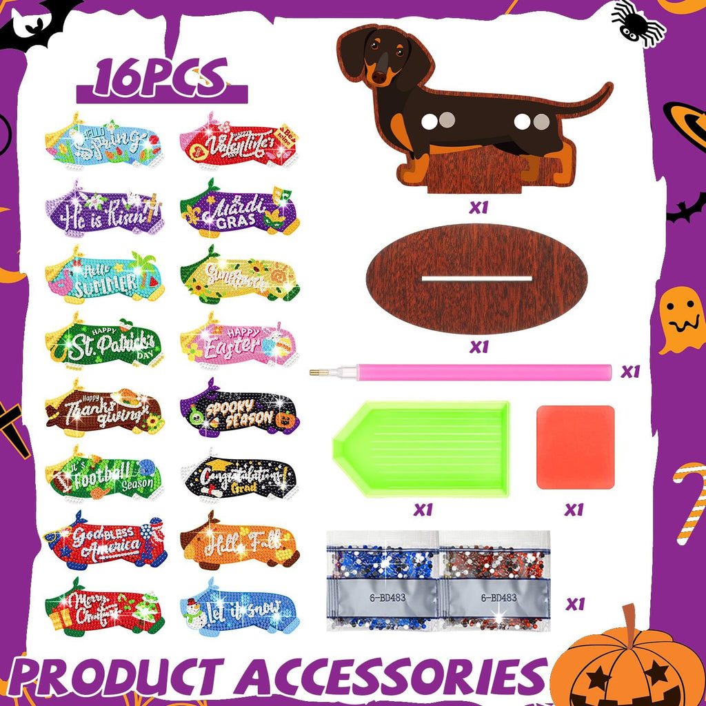 Dachshund diamond art kit with seasonal decor pieces and accessories laid out, including a wooden dachshund stand, drill pen, tray, and diamond bags.