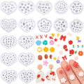 Collection of polymer clay molds and decorative elements for jewelry making, including alphabet, flower, heart, and bow shapes.