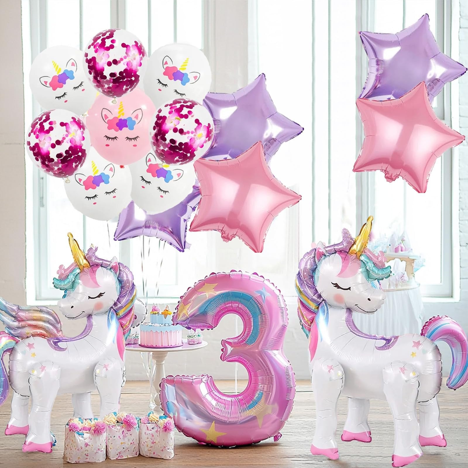 Unicorn balloon kit with two large standing unicorns, a number 3 balloon, star balloons, and printed latex balloons.